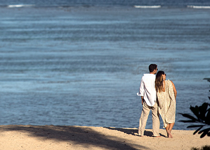 couple beachfront at Bali Benoa Holiday Inn